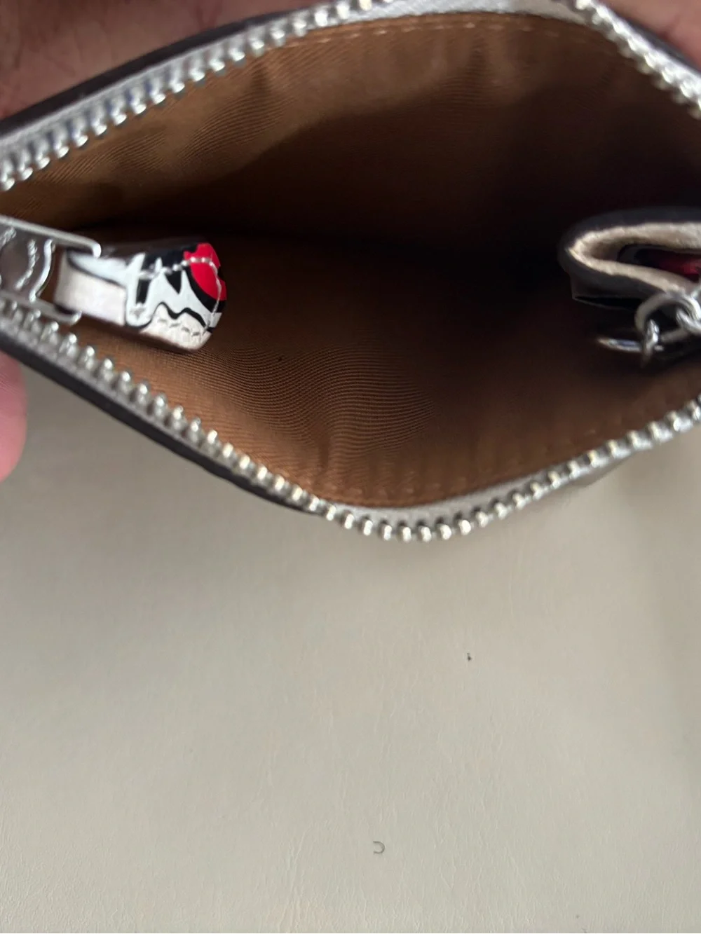Coach Leather Pouch with Red Strawberry Keychain.
